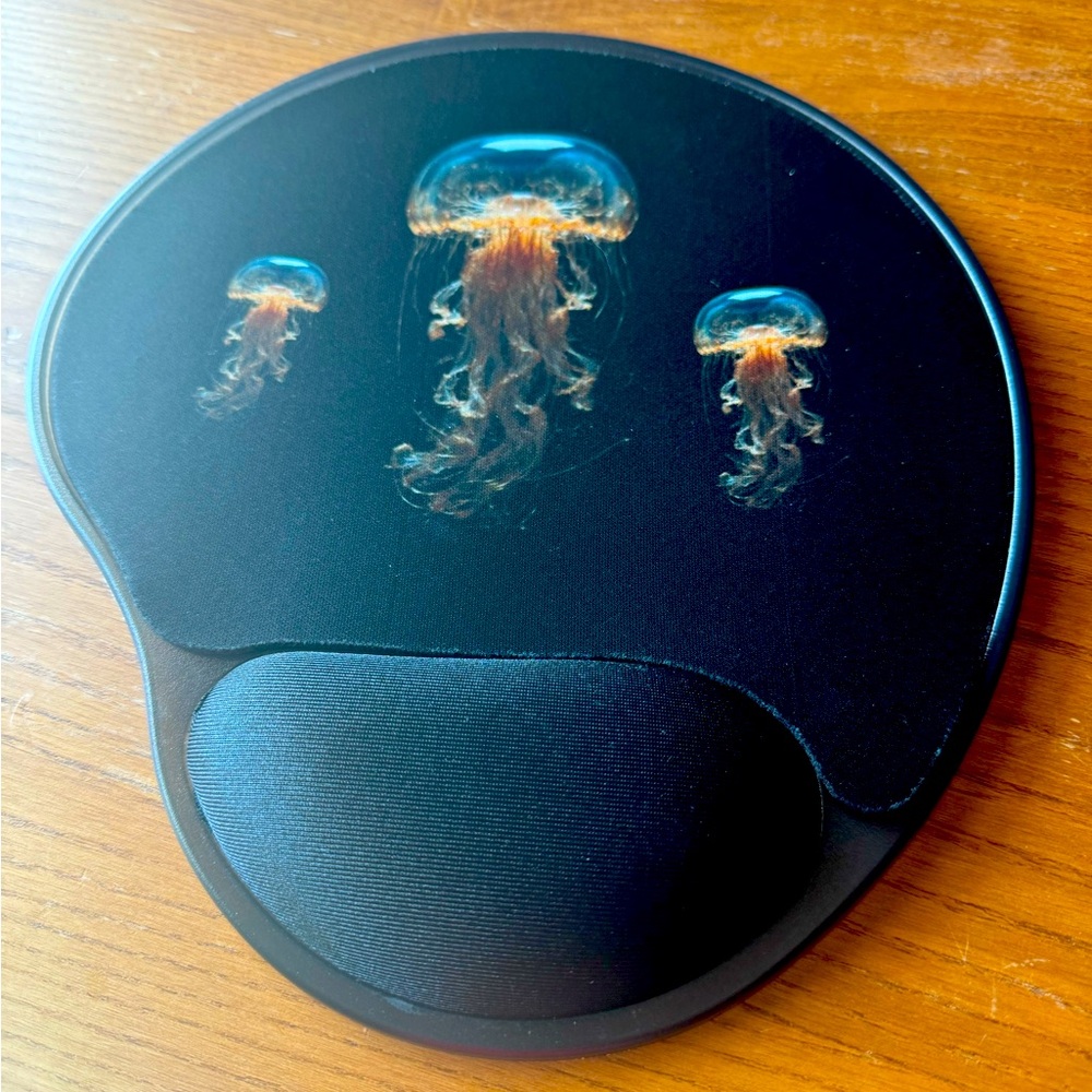 Mouse pad with wrist pillow or cushion